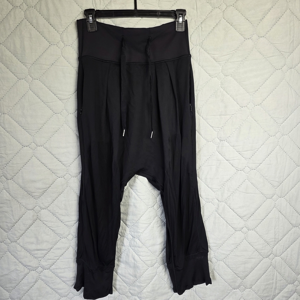 Lululemon Sz 4 
 Woman's black harem pants comfortable drawstring waist.
Joga